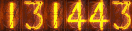 131443